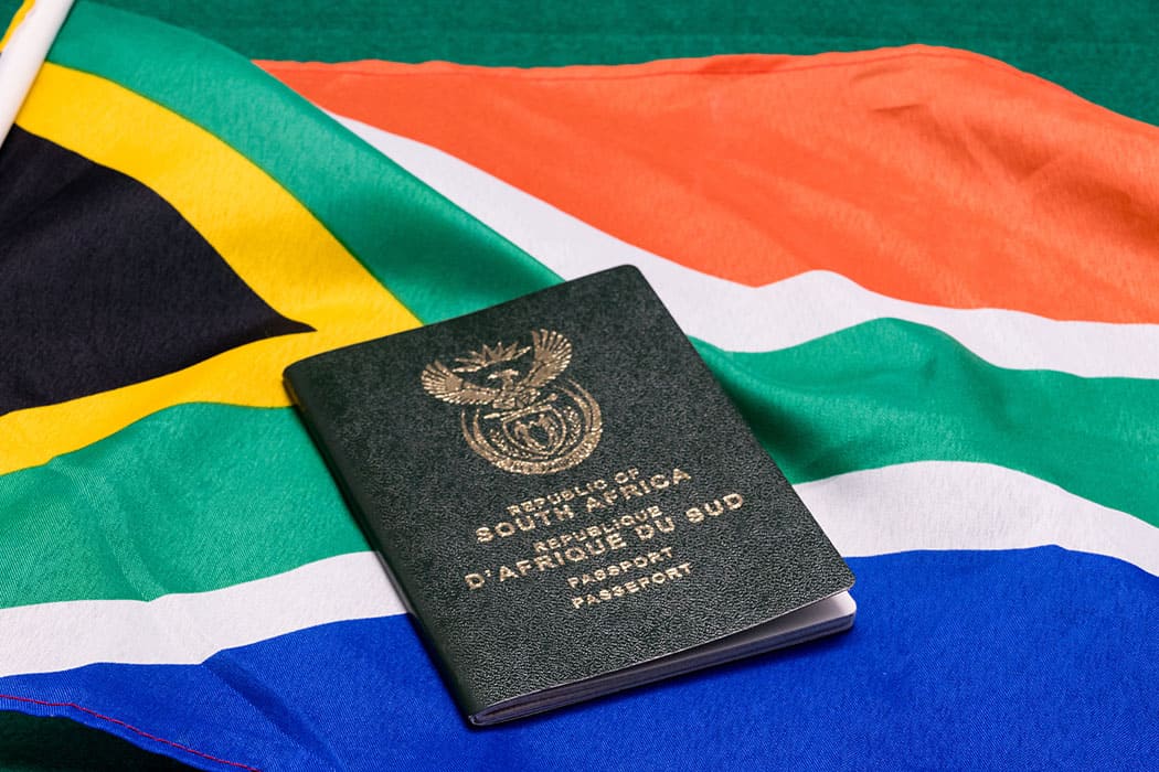 Moving to South Africa - South African passport on SA flag